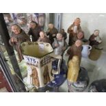 Collection of monk figures and monk themed jug