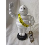 Cast Michelin man on tyre money box - H 23cm