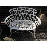 Painted white metal garden bench