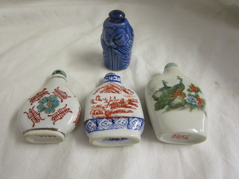 Collection of four Oriental scent bottles