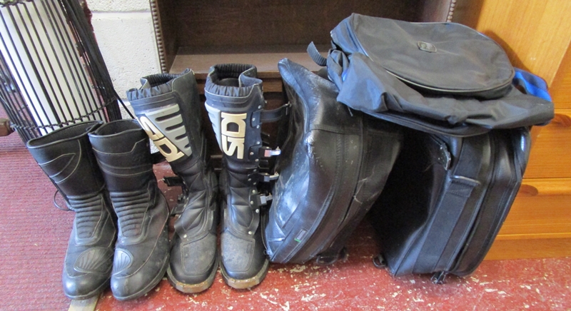 2 sets of motorcycle boots and 2 panier bags