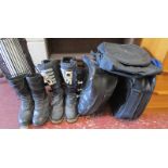 2 sets of motorcycle boots and 2 panier bags