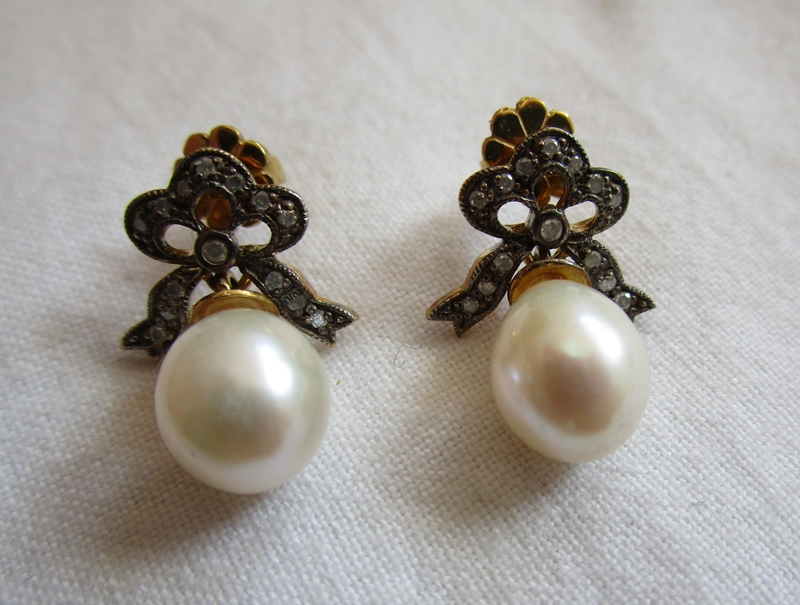 Pair of pearl & diamond bow earrings