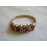 Gold ruby & diamond set ring