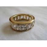 Heavy gold stone set full eternity ring