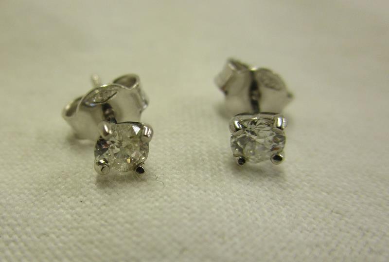 Pair of 18ct gold diamond stud earrings