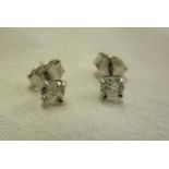 Pair of 18ct gold diamond stud earrings