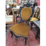 Decorative & ebonised upholstered chair