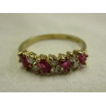 Gold ruby & diamond set ring