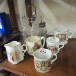 5 commemorative mugs and silver plated cruet set