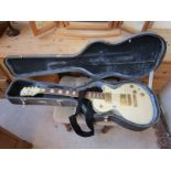 Electric guitar in case by Gould