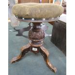 Carved Victorian revolving piano stool