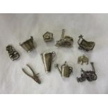 Collection of white metal charms