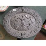 Black metal relief plaque by the American Radiator Company - Diameter 48cm