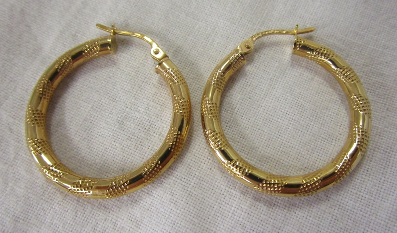 Pair of gold hoop earrings