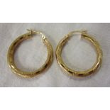 Pair of gold hoop earrings