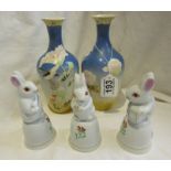 3 rabbit bells and pair of bud vases