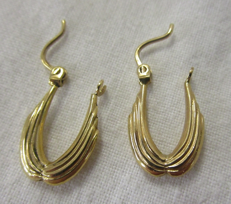 Pair of gold earrings