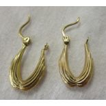 Pair of gold earrings