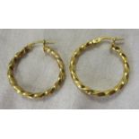 Pair of gold hoop earrings