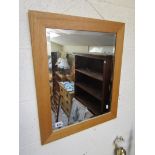 Oak framed bevelled glass mirror