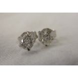 Pair of 18ct gold diamond stud earrings