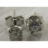 Pair of 18ct gold diamond stud earrings