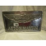 Aston Martin chrome sign