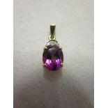 Gold amethyst and diamond pendant