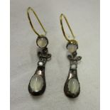 Pair of moonstone & diamond earrings