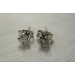 Pair of 18ct gold diamond stud earrings