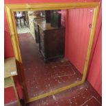 Large bevelled glass mirror in pine frame - 103cm x 134cm