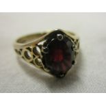 Gold garnet set ring