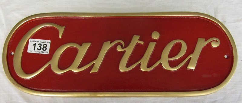 Cartier metal sign