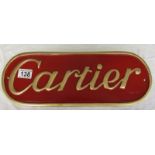 Cartier metal sign