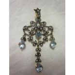 Blue topaz and diamond set pendant