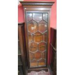 Tall mahogany glass front display cabinet