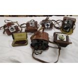 Collection of old cameras and binoculars etc