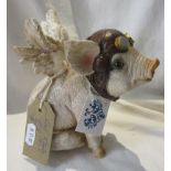Ceramic pig with wings