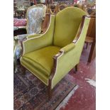 Green upholstered Edwardian arm chair