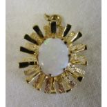 Gold opal set pendant