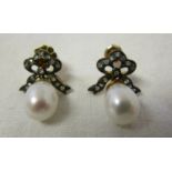 Pair of pearl and diamond earrings