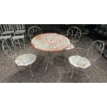 Antique metal garden table and four chairs