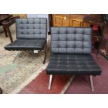 Pair of black leather Barcelona chairs