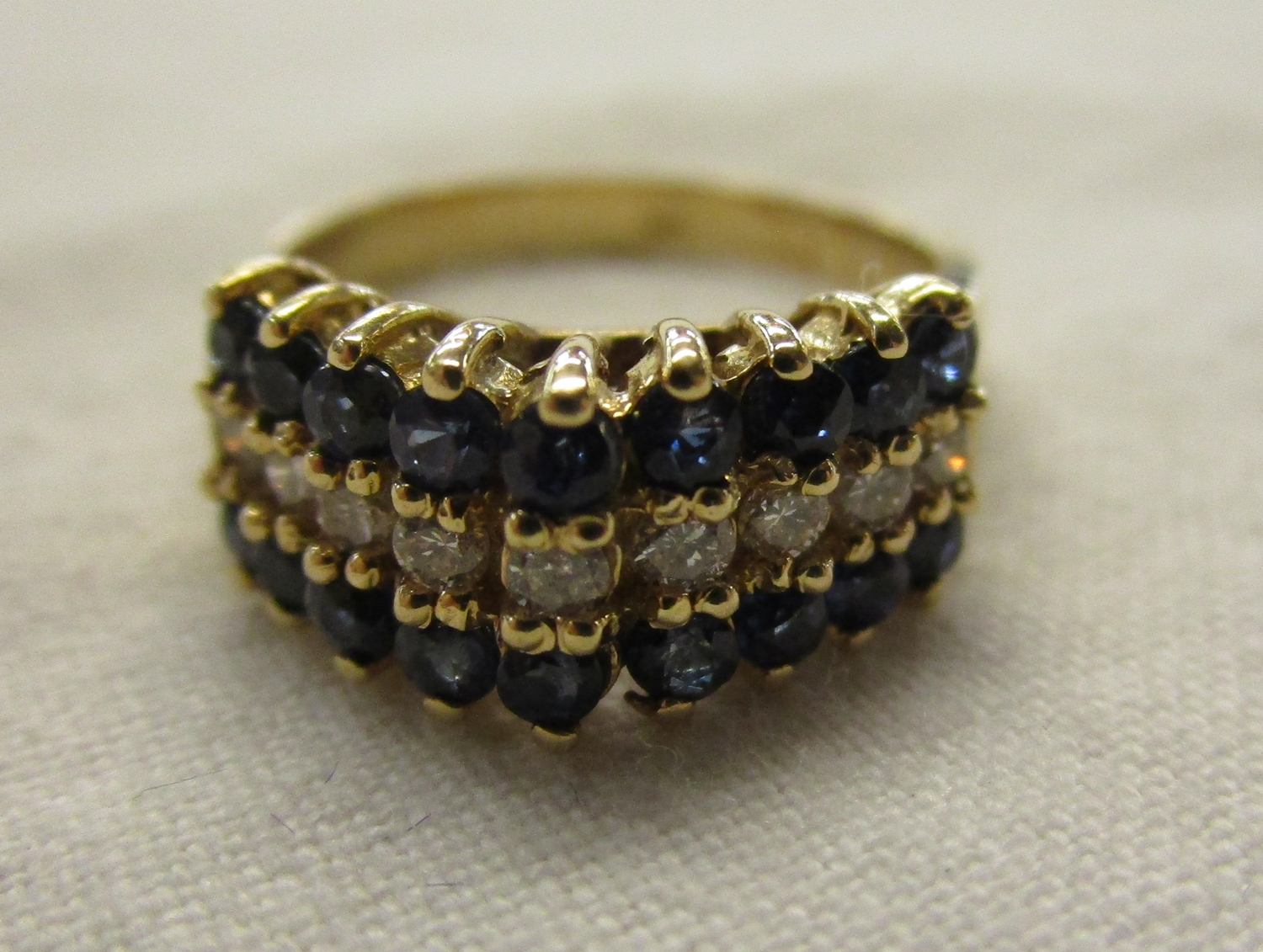 Unusual gold sapphire & diamond set ring