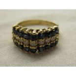 Unusual gold sapphire & diamond set ring