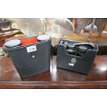 2 cased sets of binoculars