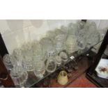 Large collection of glass jelly moulds to include Victorian examples - Entire shelf