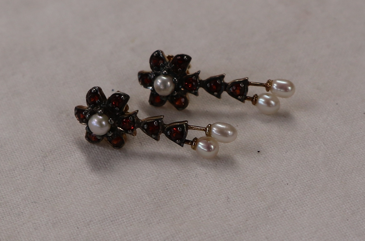 Pair of garnet & pearl drop earrings