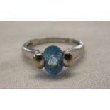 White gold blue stone set ring